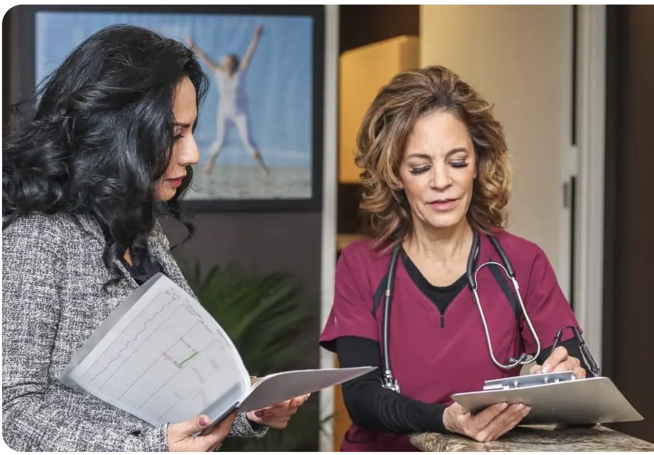 A physician reviewing results with a patient